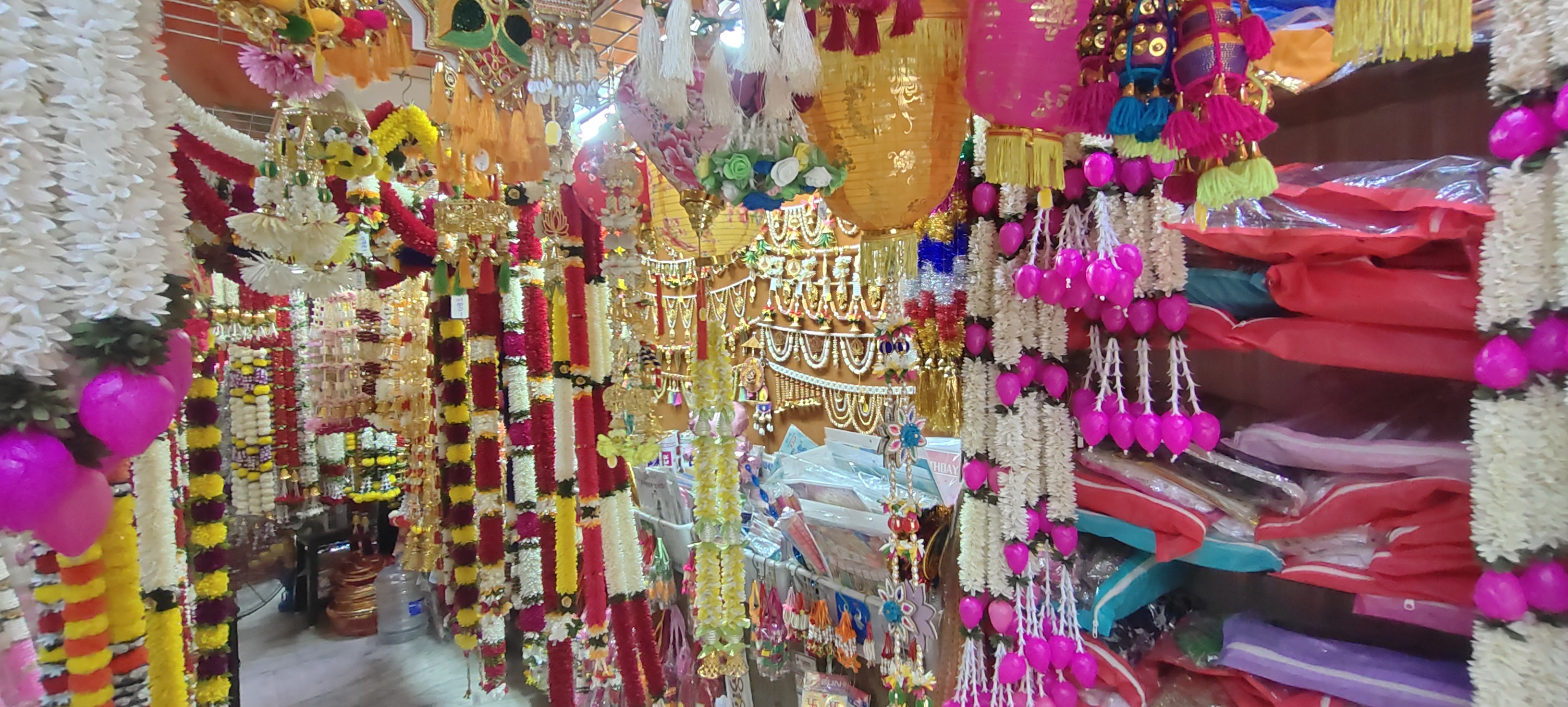 Showroom Interior Walkway and Festive Garland Displays at C2 Sons